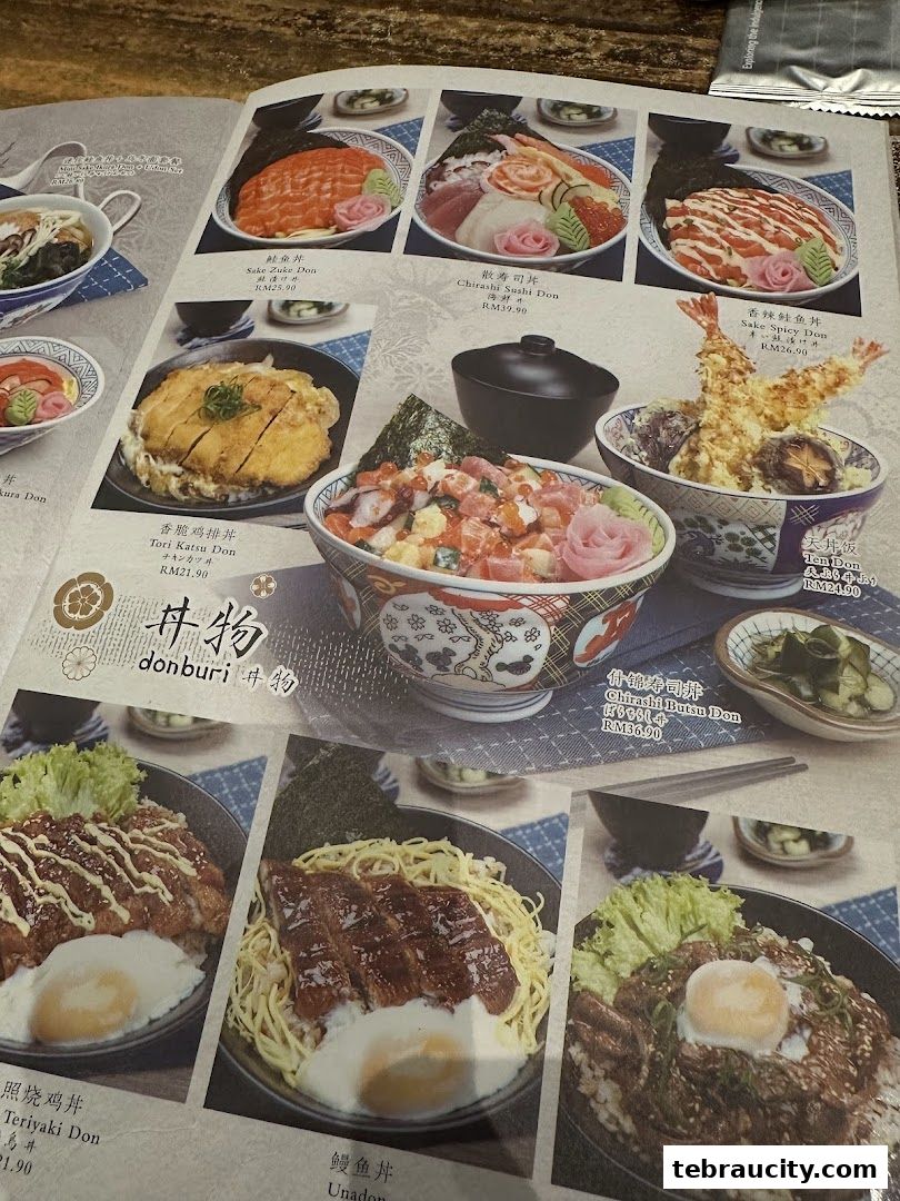 A menu page showcasing various Japanese donburi dishes with appetizing food photography.