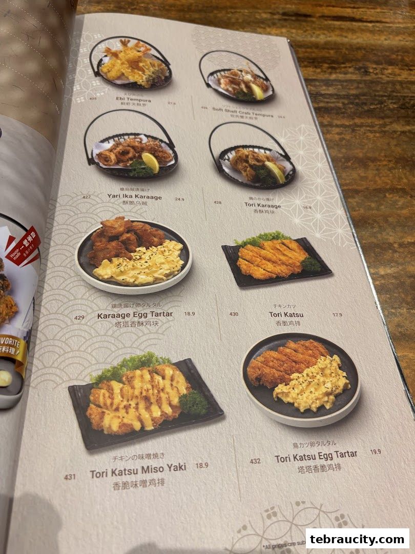 A menu page from Kinsahi Japanese Restaurant showcasing various fried dishes with prices.