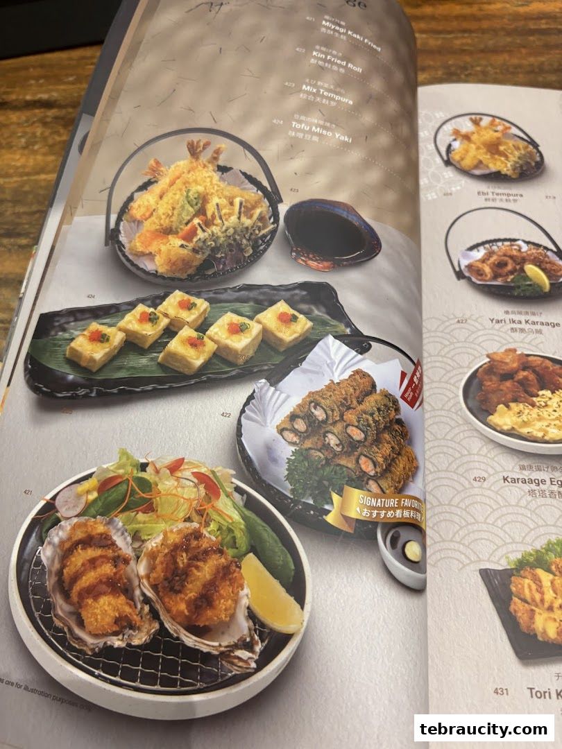 A menu page from Kinsahi Japanese Restaurant featuring various tempura and fried dishes.