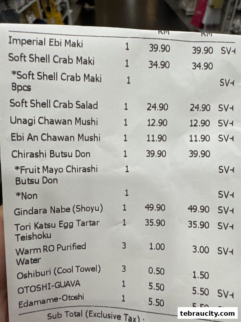 A close-up of a receipt from Kinsahi Japanese Restaurant listing various Japanese dishes and their prices.