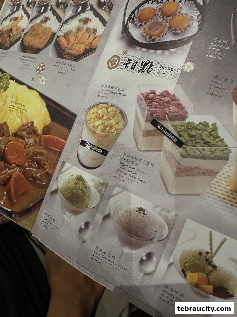 A close-up view of a Japanese restaurant's dessert menu, showcasing various sweet treats.