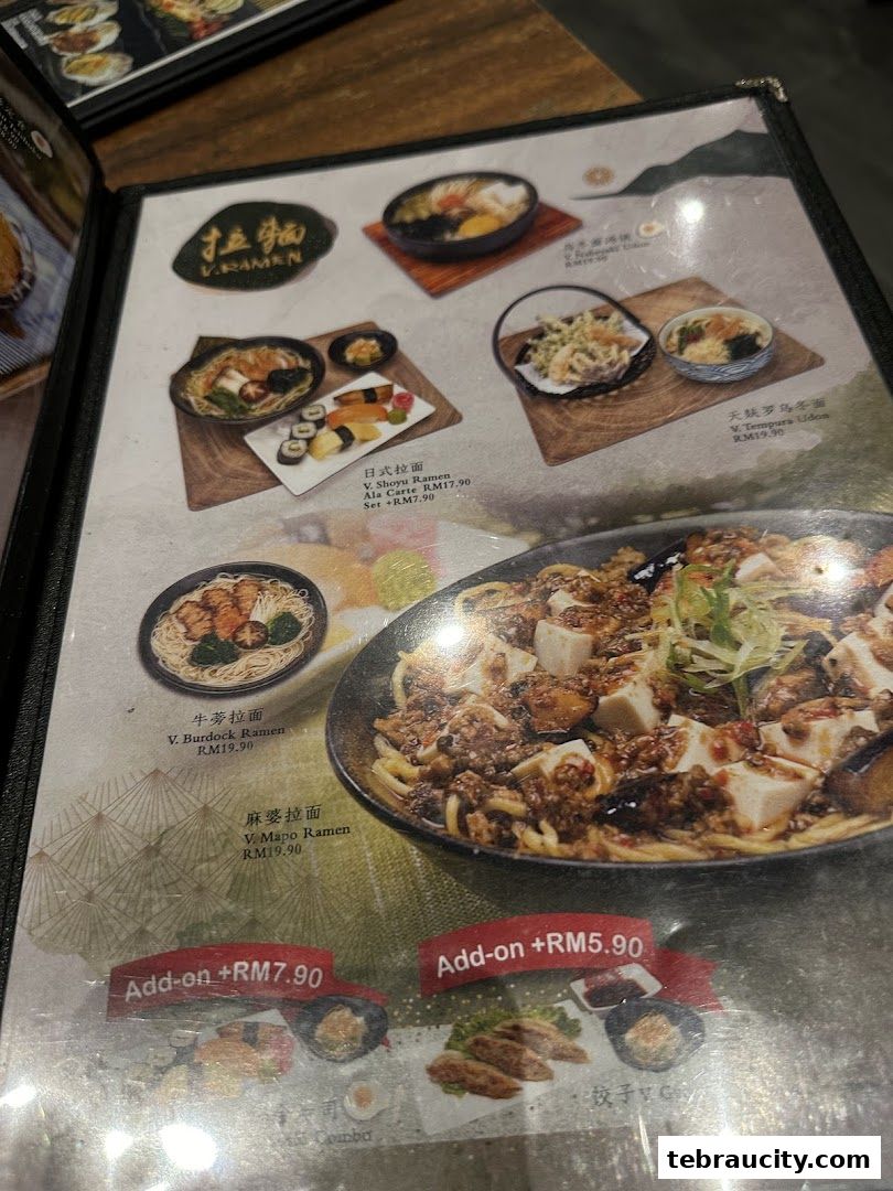 A menu from Kinsahi Japanese Restaurant featuring various ramen and udon dishes with prices.