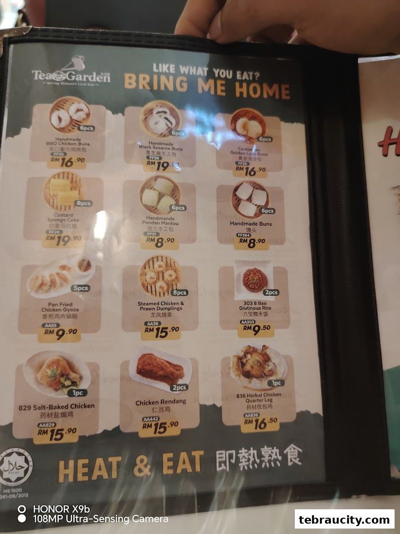 A menu from Tea Garden featuring various steamed buns, cakes, dumplings, and chicken dishes.