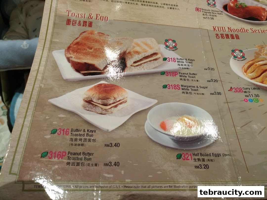 A menu page from Kuu By Tea Garden featuring toast, buns, and eggs.