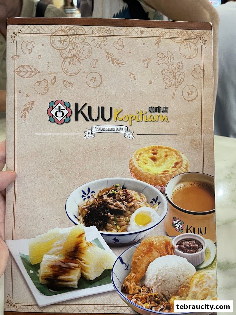 A menu from Kuu Kopitiam featuring traditional Hainanese dishes and drinks.