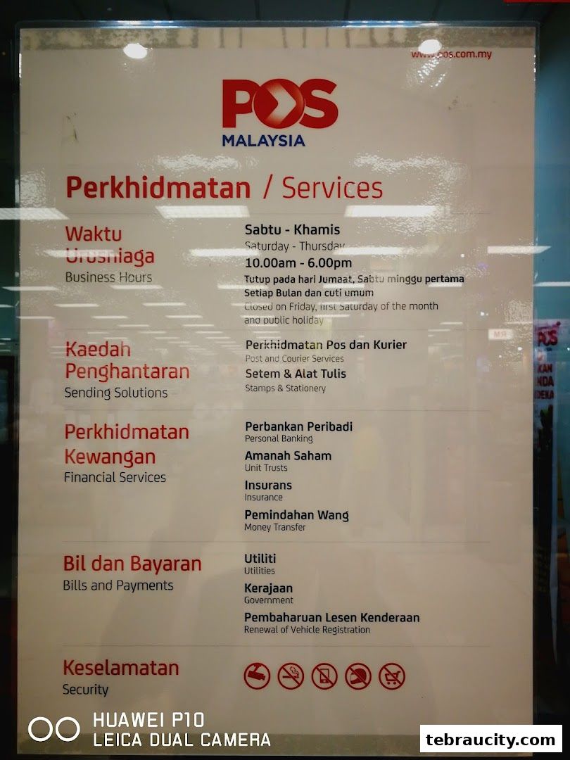 A sign displaying services offered by POS Malaysia, including business hours and categories of services.