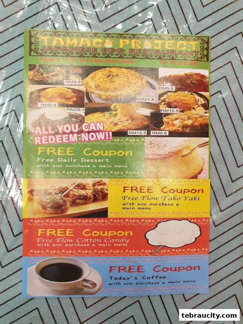 A flyer for Tamag Project Japanese Egg Restaurant featuring food images and free coupon offers.