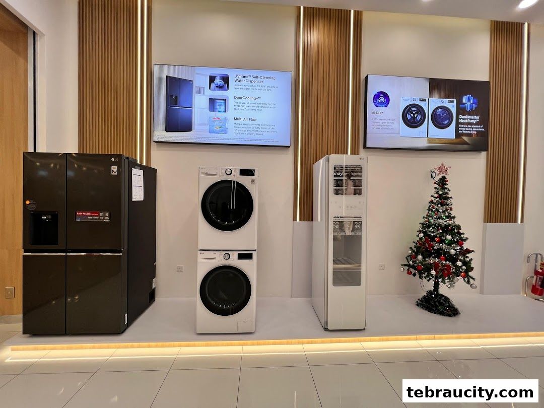 LG appliances including a refrigerator, washer, dryer, and water dispenser, with a Christmas tree.