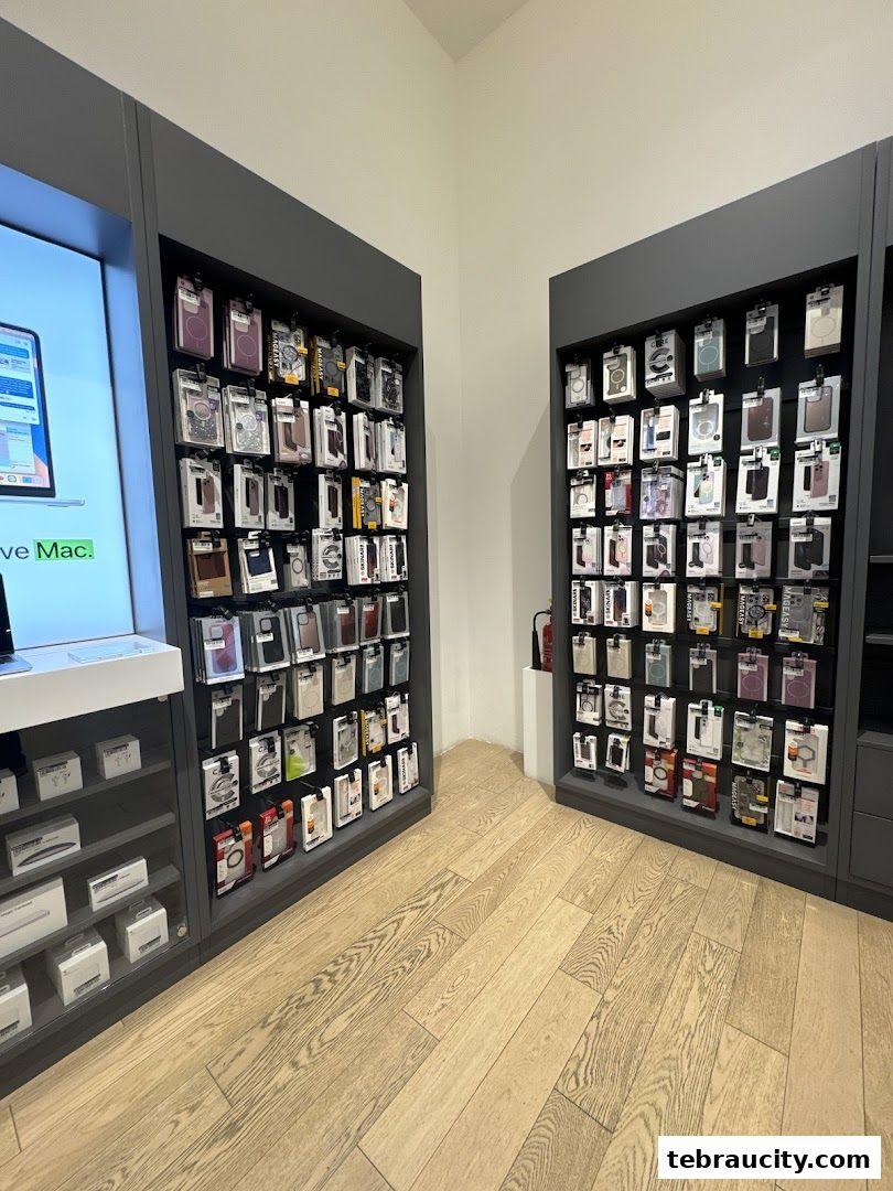 Interior view of an Apple Reseller Store showcasing a wide selection of phone cases on display shelves.
