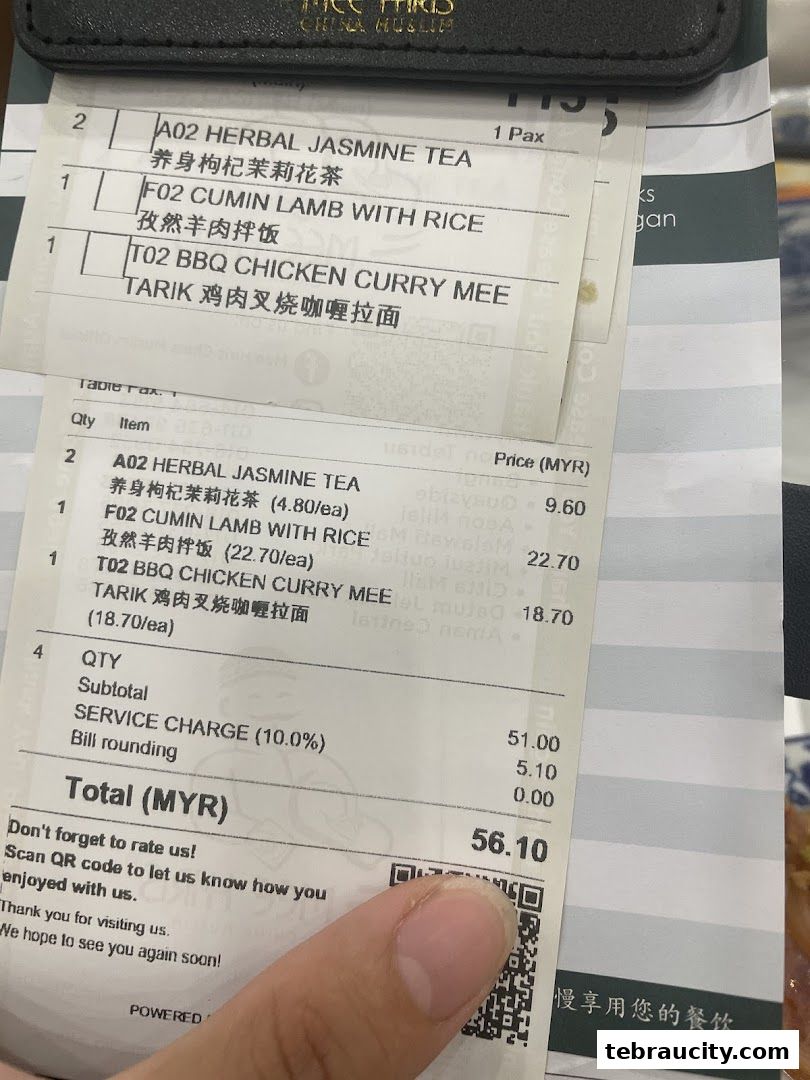 A receipt from Mee Hiris China Muslim showing food items and prices.
