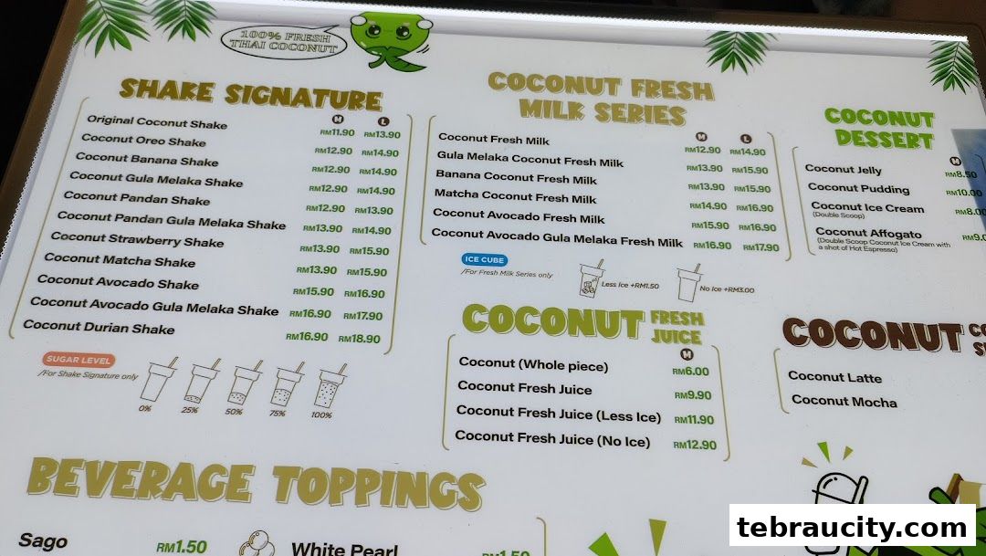 A menu board displaying various coconut-based shakes, milk drinks, desserts, and fresh juices.