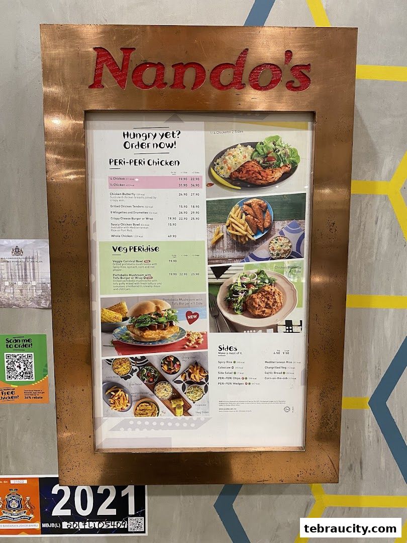 A Nando's menu board displaying Peri-Peri Chicken and Veg options with prices.