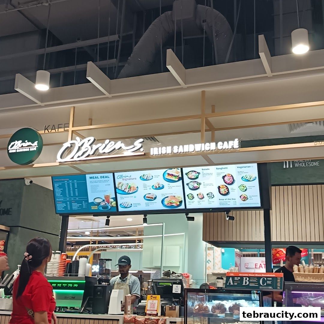 O'Briens Irish Sandwich Cafe counter with menu displays and staff serving customers.