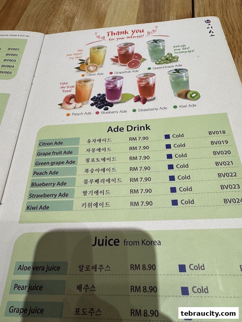 A menu page from Oiso Korean Restaurant featuring Ade drinks and juices with prices.