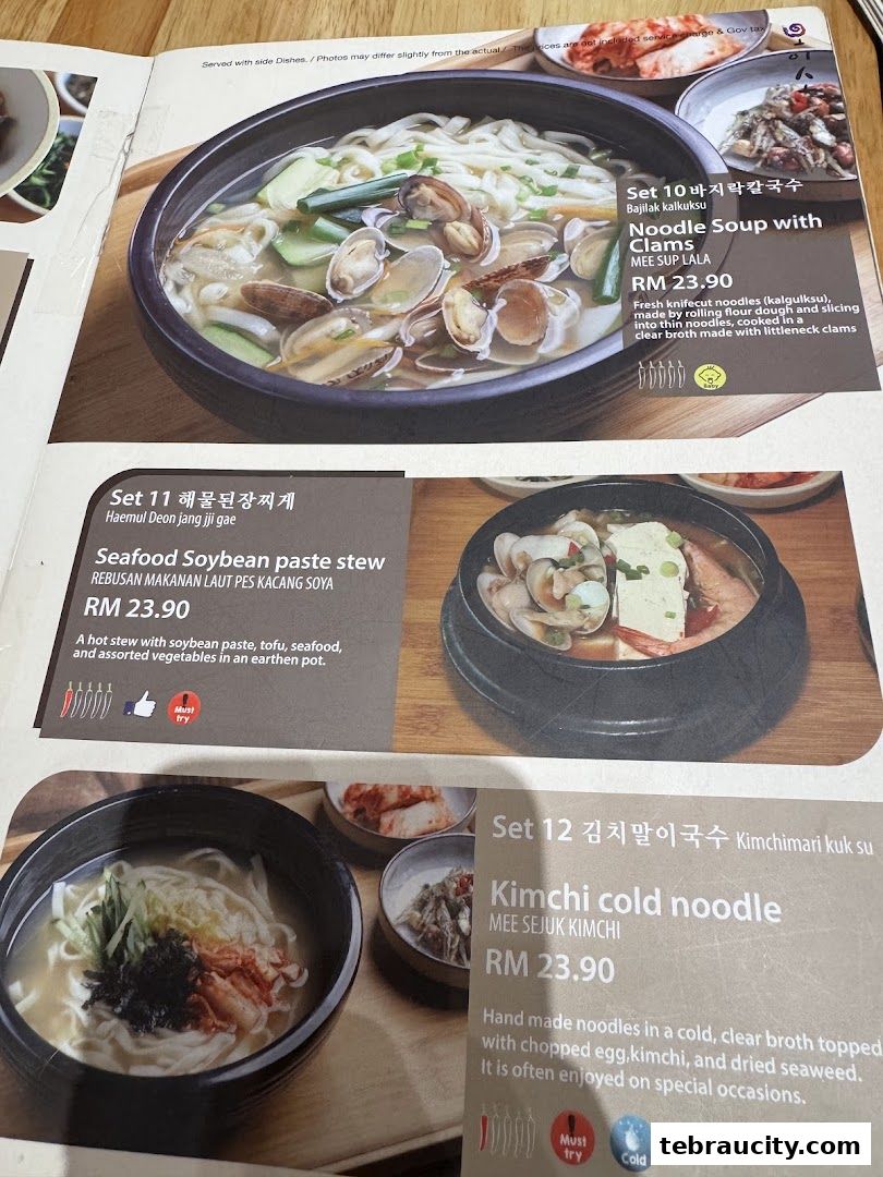 A menu from Oiso Korean Restaurant featuring three popular dishes with descriptions and prices.