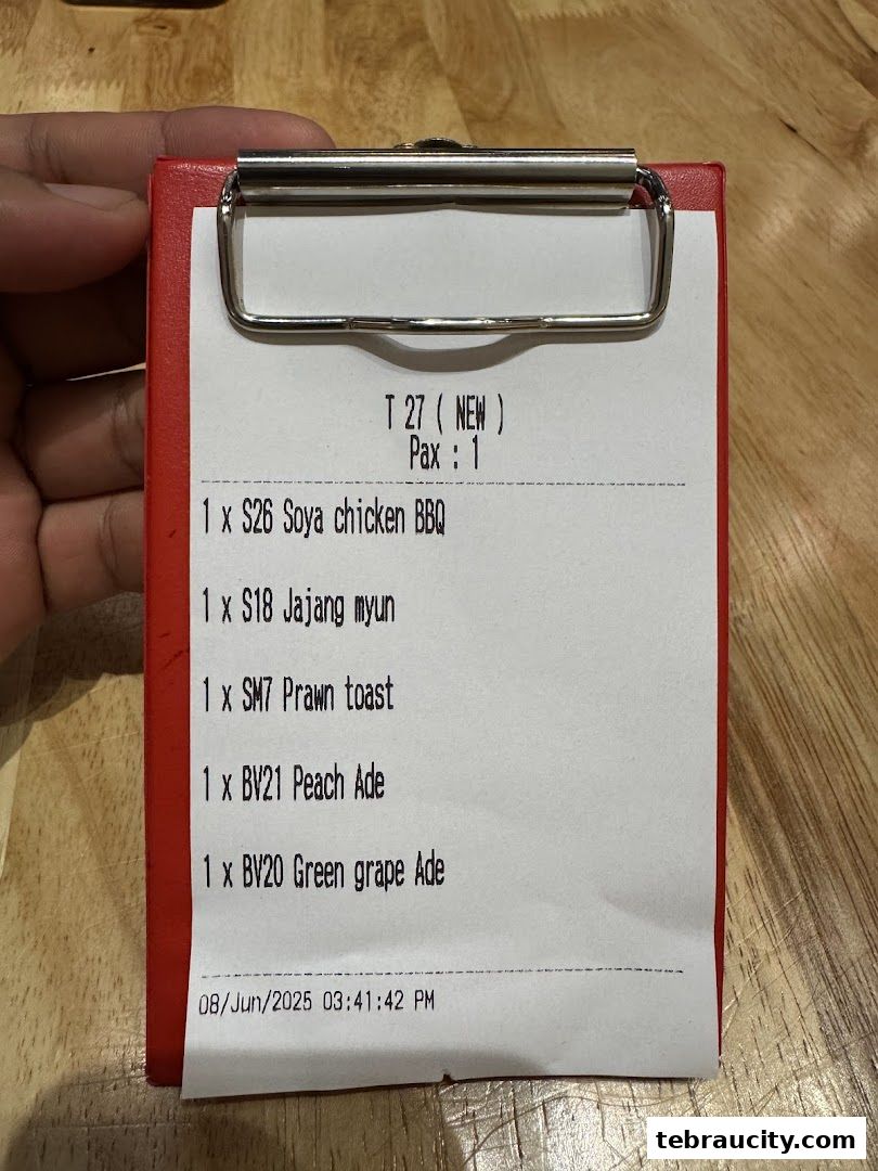 A receipt from Oiso Korean Restaurant listing food and drink orders.