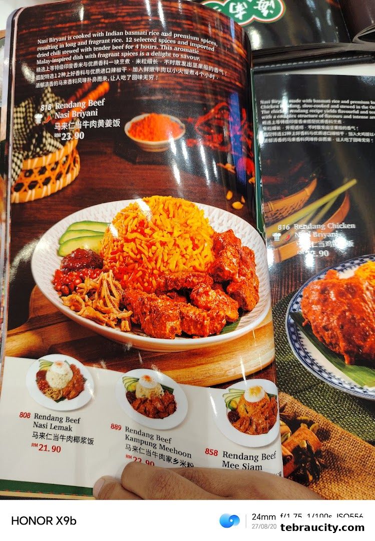 A menu page showcasing various Rendang dishes with detailed descriptions and prices.