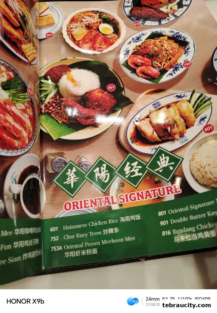 A menu page showcasing various Malaysian dishes with vibrant food photography.