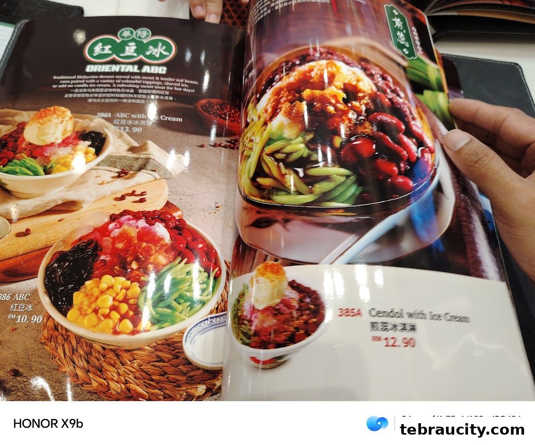A menu page showcasing traditional Malaysian desserts like ABC and Cendol.