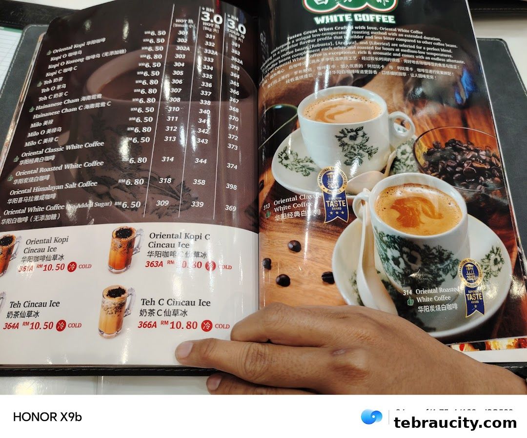 A menu from Oriental Kopi featuring various coffee and tea drinks with prices.