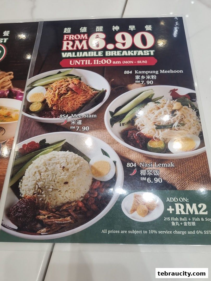 A menu featuring breakfast dishes like Mee Siam, Kampung Meehoon, and Nasi Lemak with prices.