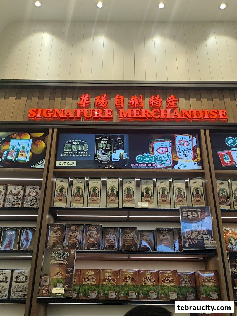 Shelves filled with Oriental Kopi merchandise, including coffee and tea products.