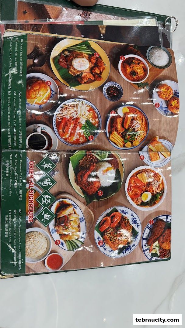 A menu featuring various Malaysian dishes with appetizing food photography.