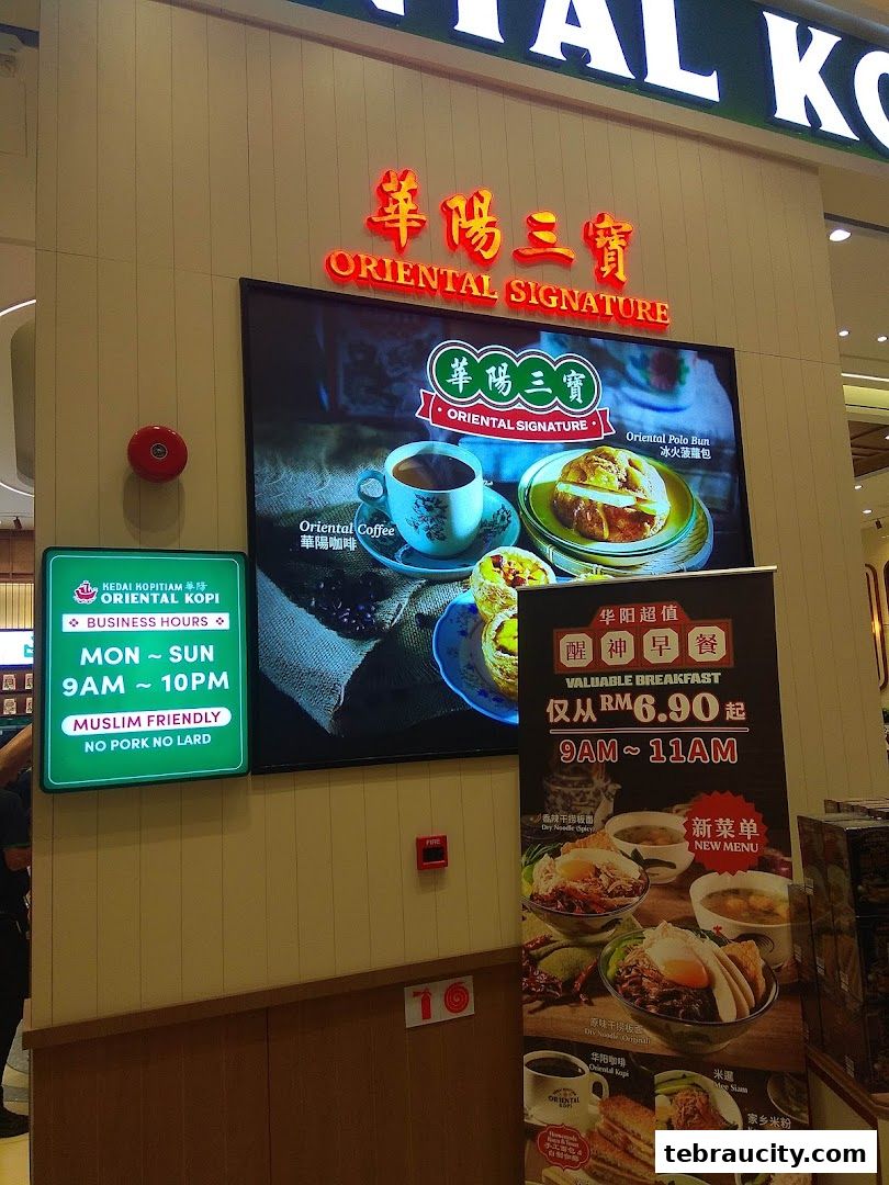 Oriental Kopi shop front with signage, menu display, and business hours.