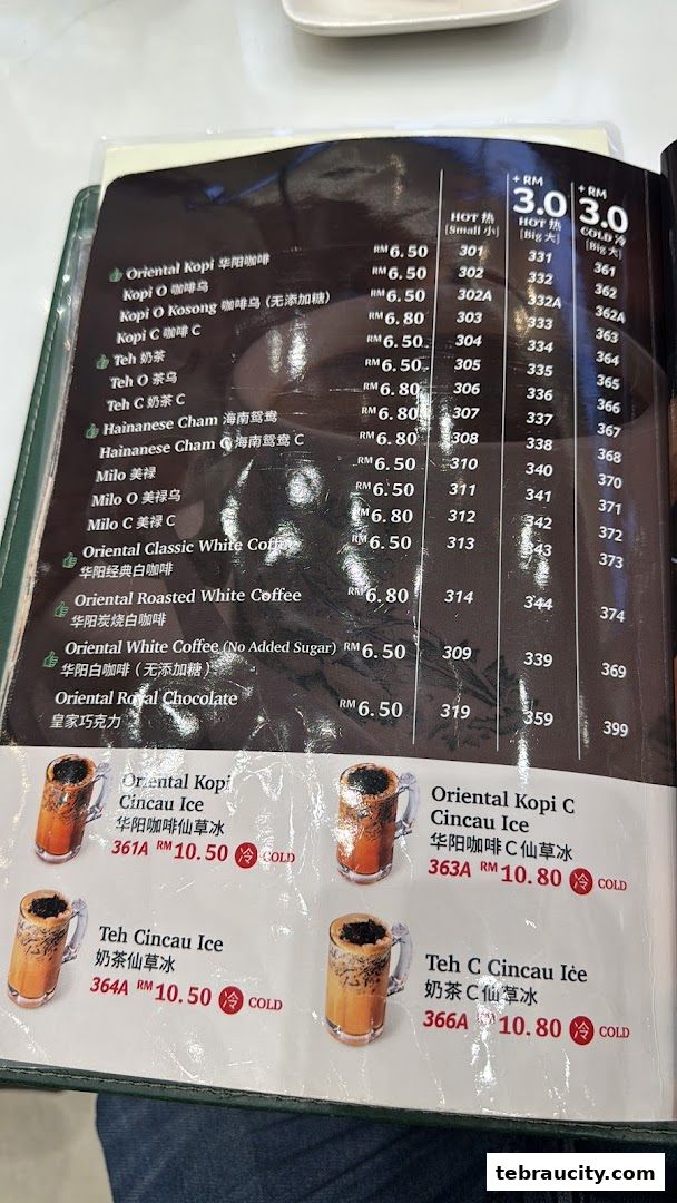 A menu from Oriental Kopi featuring various coffee and tea drinks with prices.
