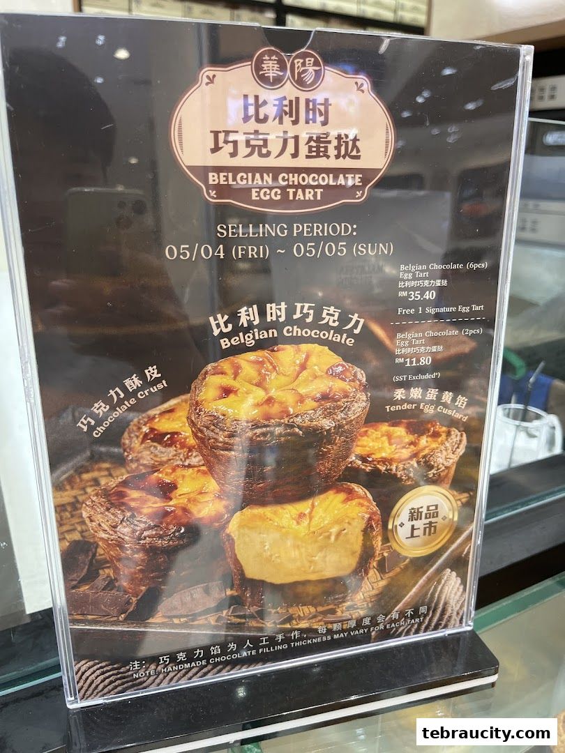 A menu board displays Belgian Chocolate Egg Tarts with prices and selling period.
