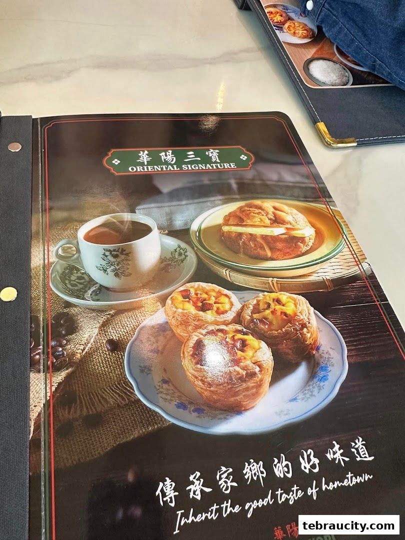 A menu cover featuring coffee, pastries, and a sandwich with the shop's name and slogan.