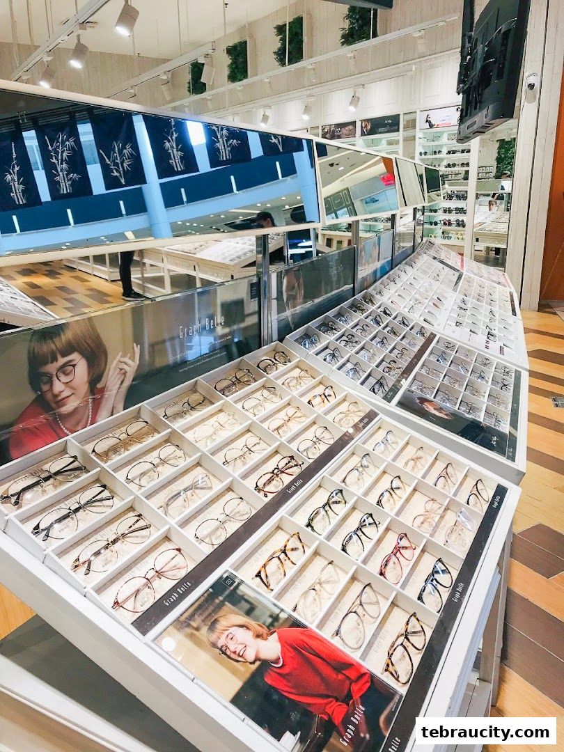 Interior view of an optical shop showcasing a wide selection of eyeglasses on display.