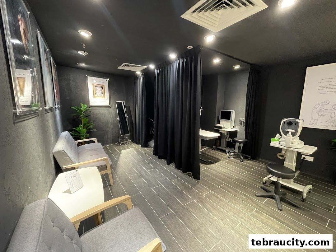 Interior of an optical shop with seating, examination equipment, and eye charts.