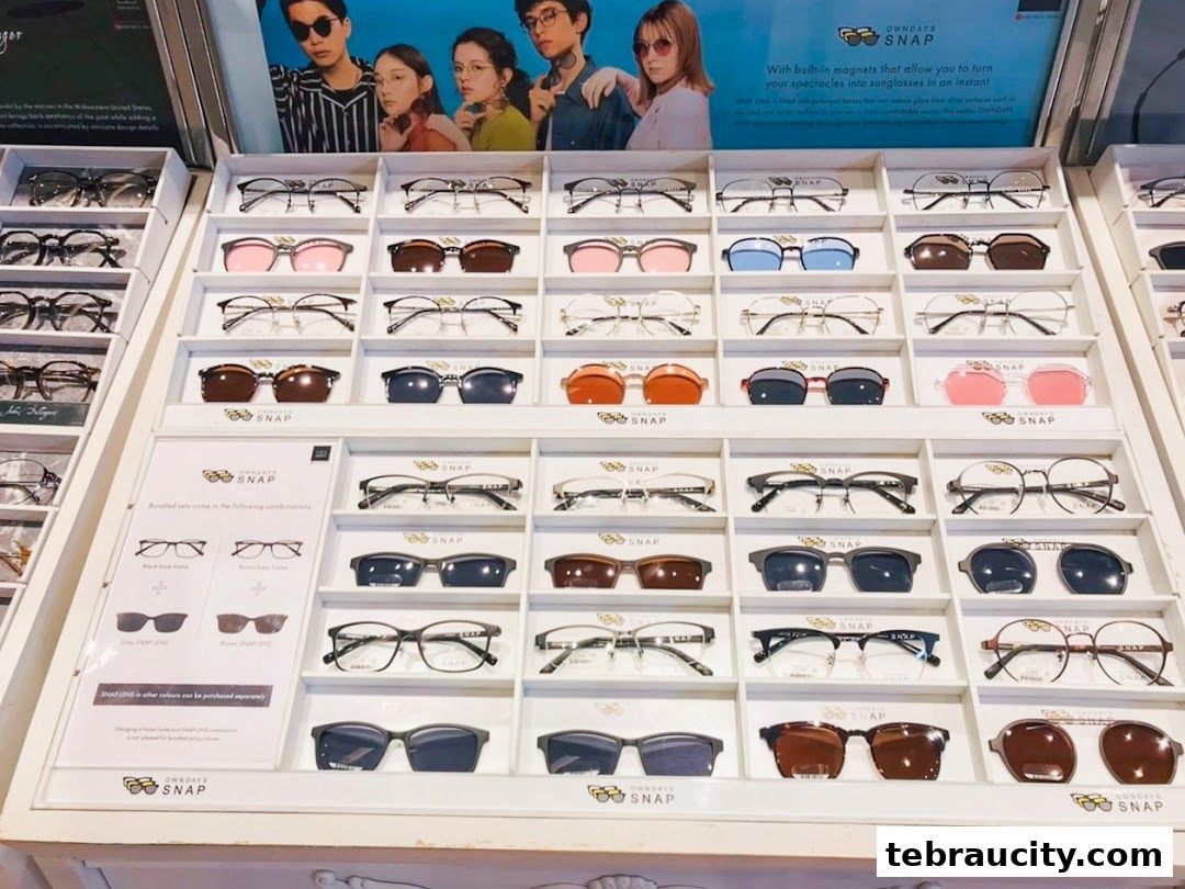 A display of various eyeglasses and clip-on sunglasses at OWNDAYS.