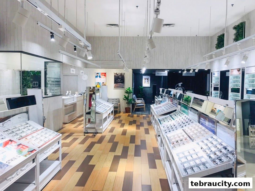 Interior view of an optical shop showcasing a wide selection of eyeglasses on display.