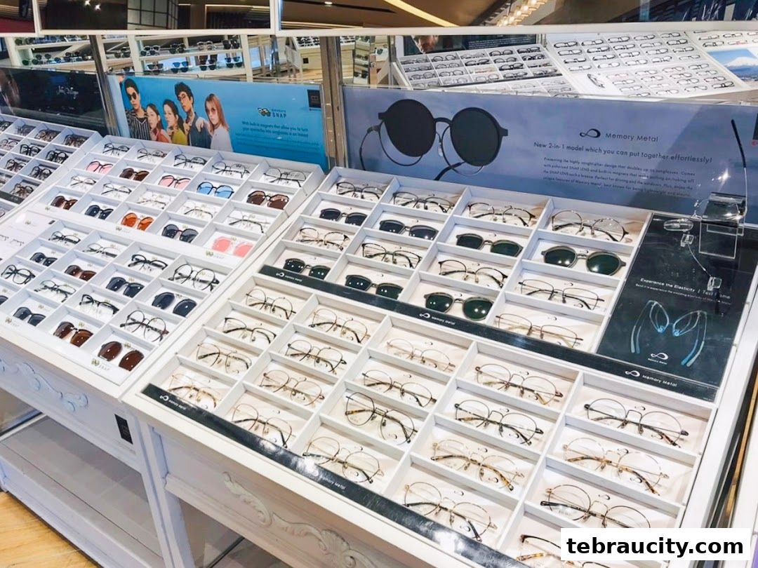 A display of various eyeglasses and sunglasses in a retail store.