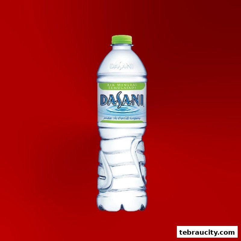 A bottle of Dasani mineral water with a green cap against a red background.