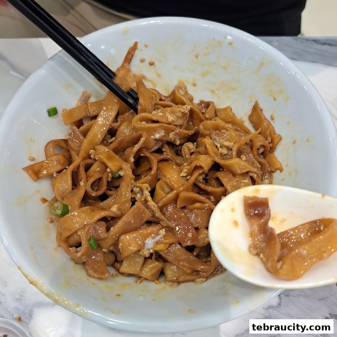 A close-up shot of a bowl of delicious-looking Penang Road Teochew Chendul noodles.