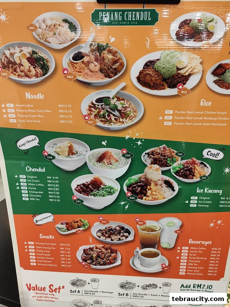 A menu board showcasing various Malaysian dishes and beverages with appealing food photography.