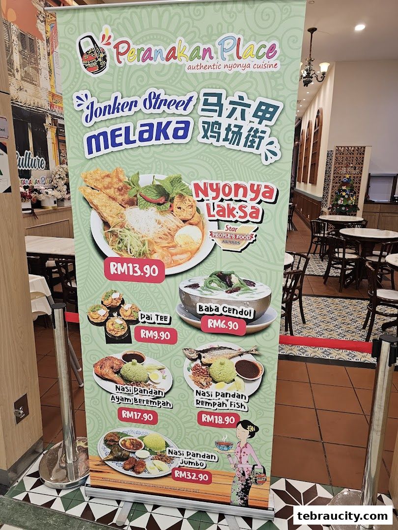 A banner advertising Peranakan Place restaurant with various Nyoya dishes and prices.
