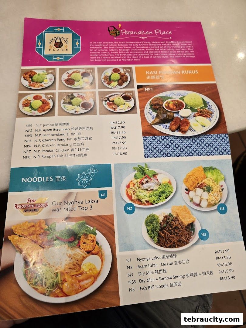 A menu from Peranakan Place featuring Nasi Pandan Kukus and Noodles dishes.
