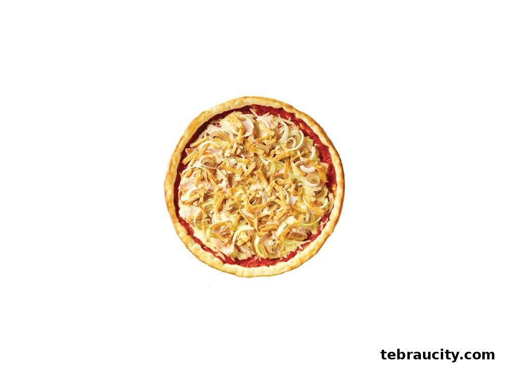 A delicious pizza with a variety of toppings, including onions and cheese.