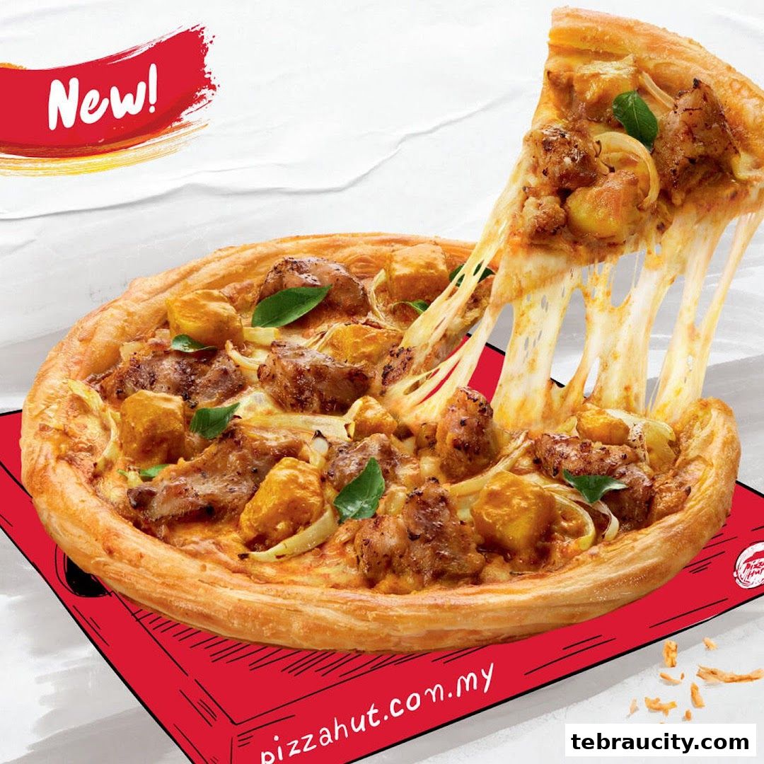A delicious Pizza Hut pizza with a slice being pulled, showing melted cheese and toppings.
