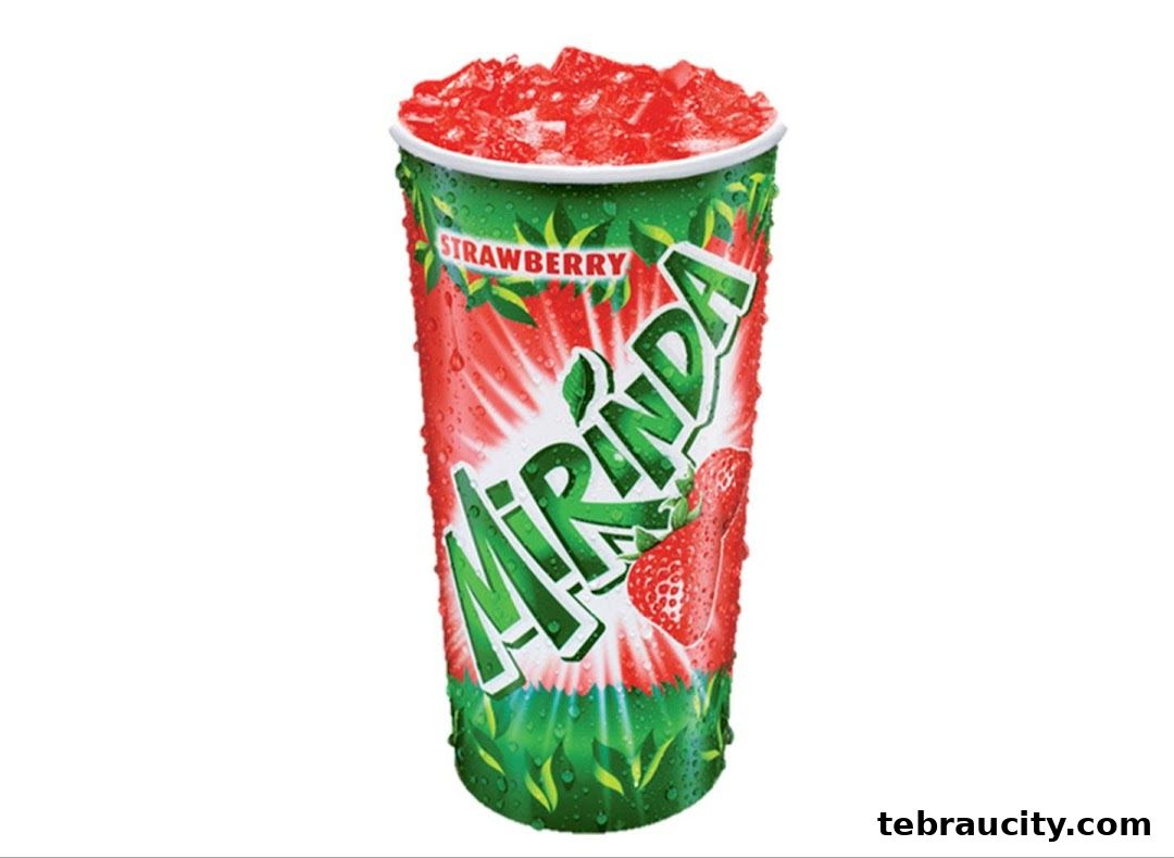 A tall cup of strawberry flavored crushed ice drink with the brand name Mirinda.