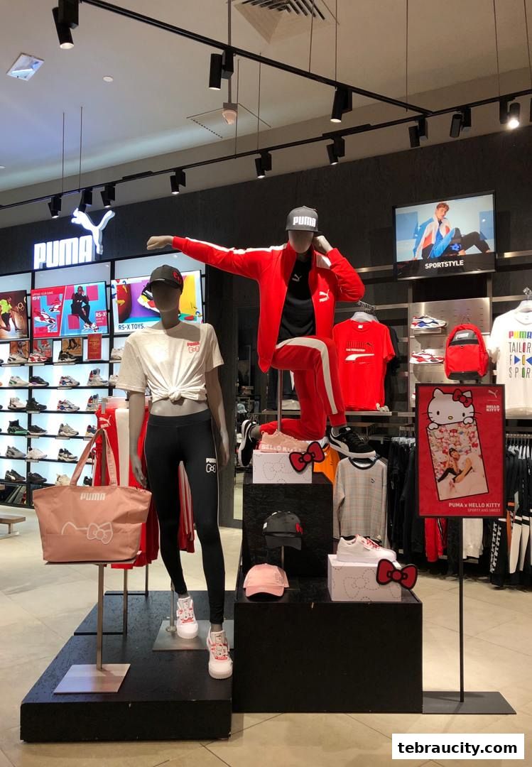 Mannequins display Puma sportswear and accessories, including a Hello Kitty collaboration.