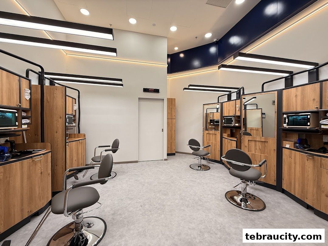 Interior view of a modern hair salon with multiple styling stations and chairs.