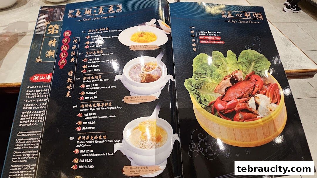 A menu from Restaurant Chao Shan Aeon Tebrau featuring various shark fin soups and a frozen crab dish.