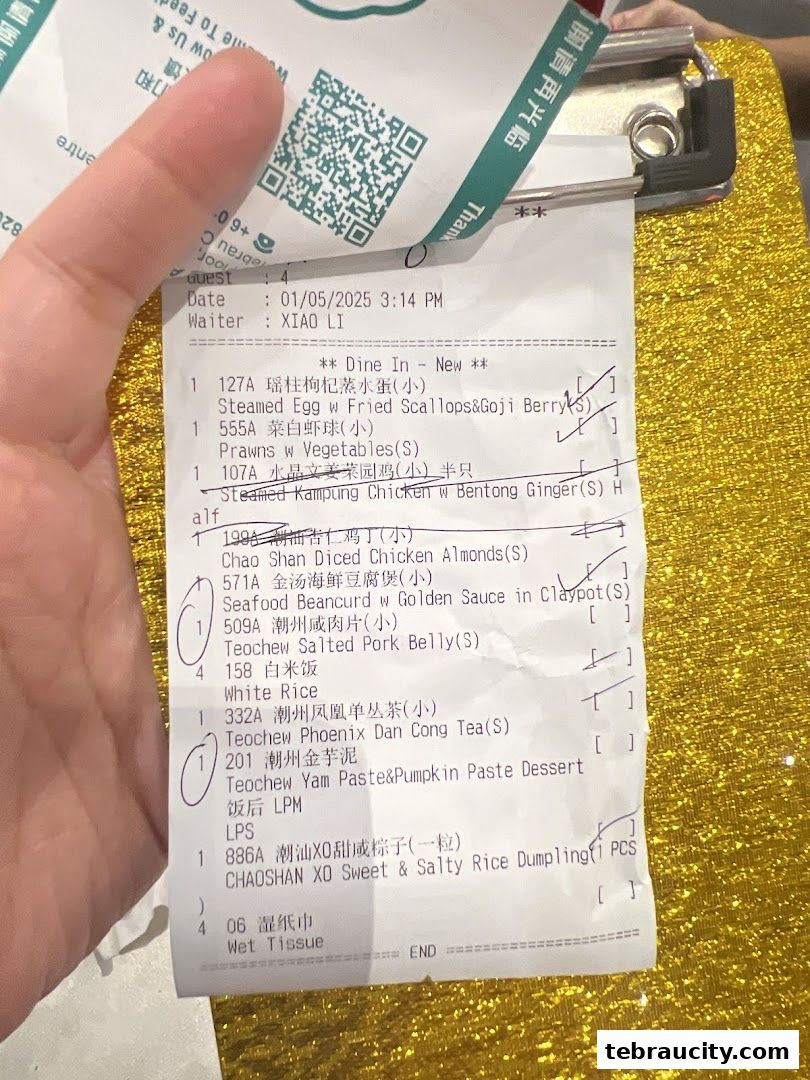 A close-up of a restaurant receipt listing various Chinese dishes and their prices.