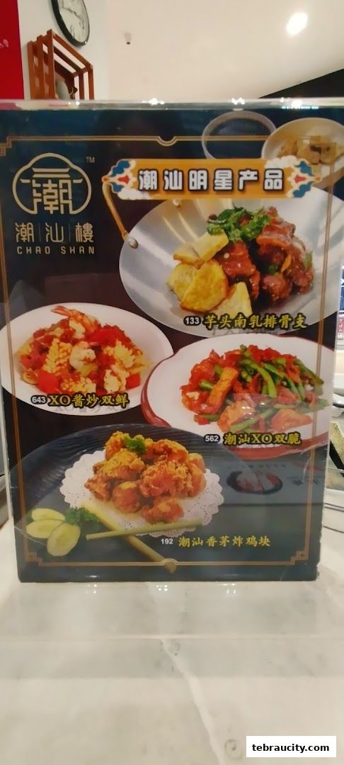 A menu featuring popular dishes from Chao Shan restaurant, including fried chicken and stir-fried seafood.