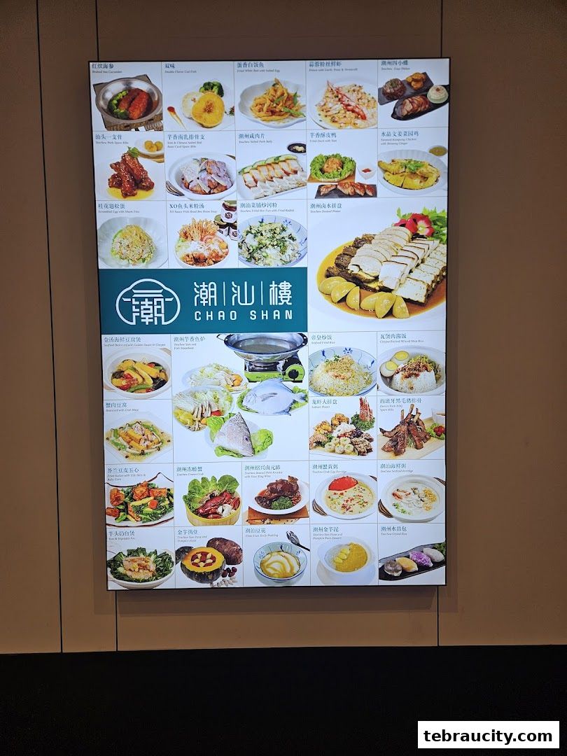 A brightly lit menu board displaying various Chinese dishes with appetizing food photography.